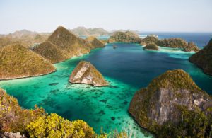 Wayag in northern Raja Ampat, Limestone islands form a remote lagoon, image by Ethan Daniels, shutterstock