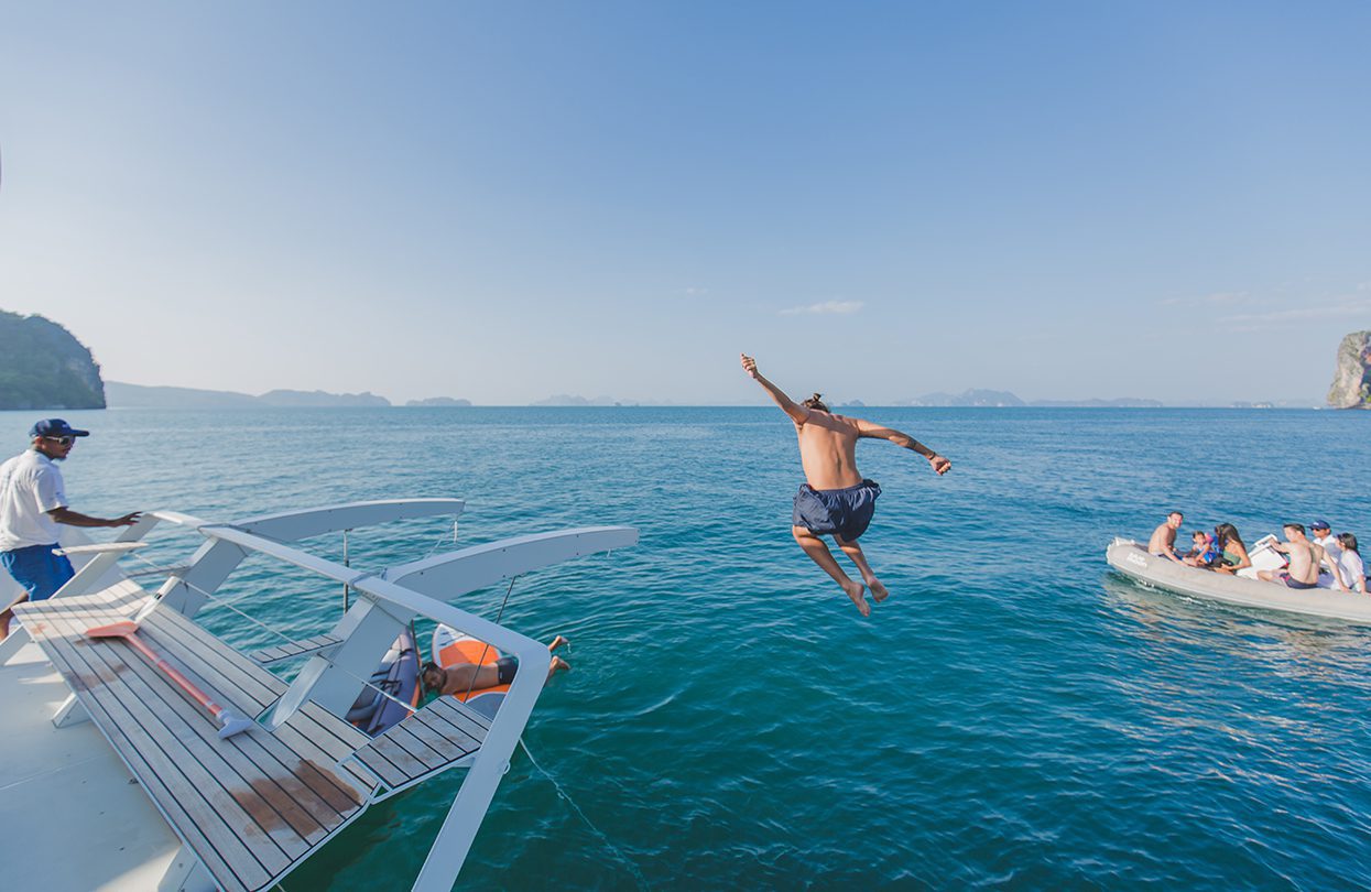 Plunging into the cool waters of Phuket to beat the heat, Photo - Wan Tse, Simpson Yacht Charter