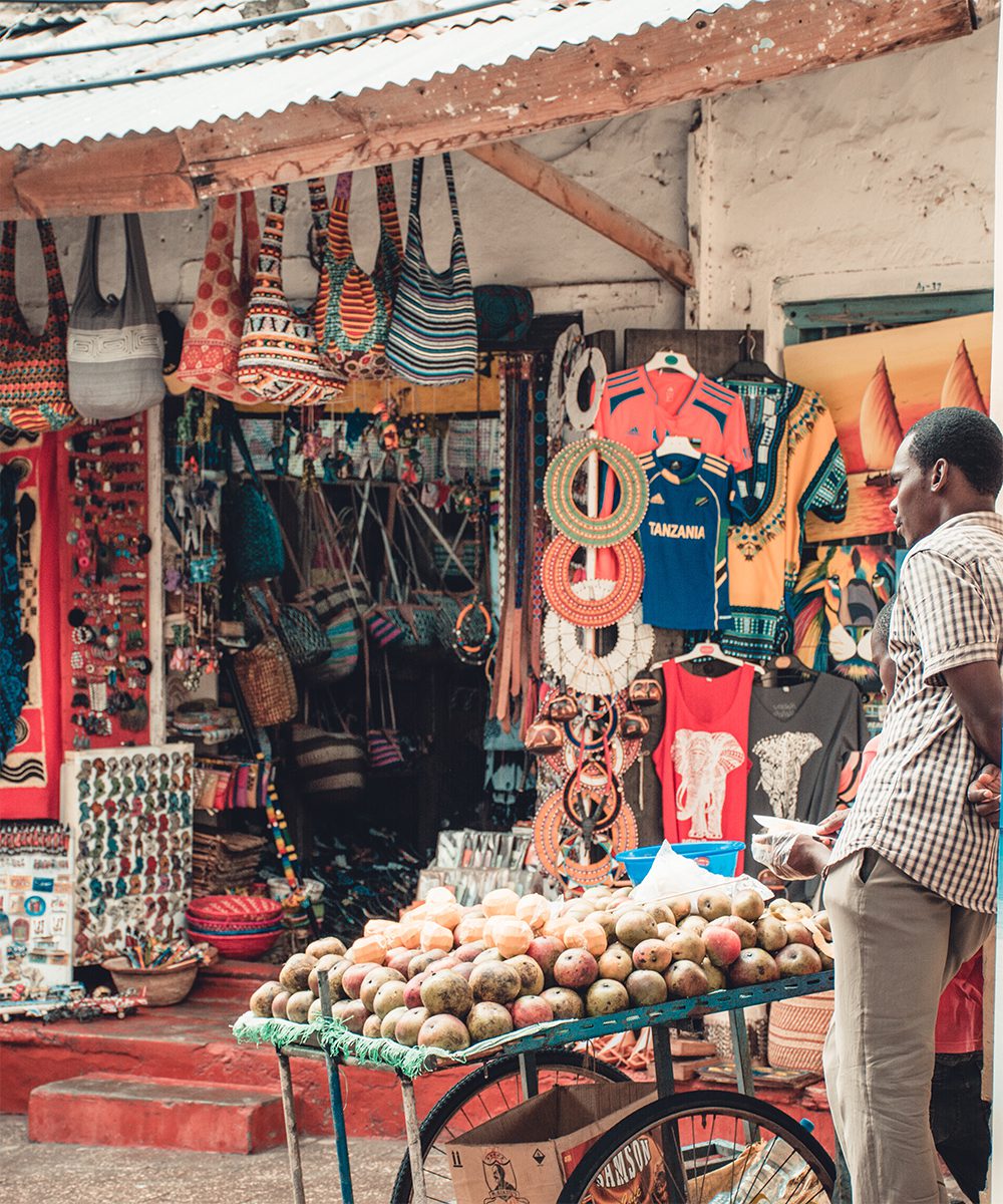 Curios and tropical fruits in a Stone Town alley