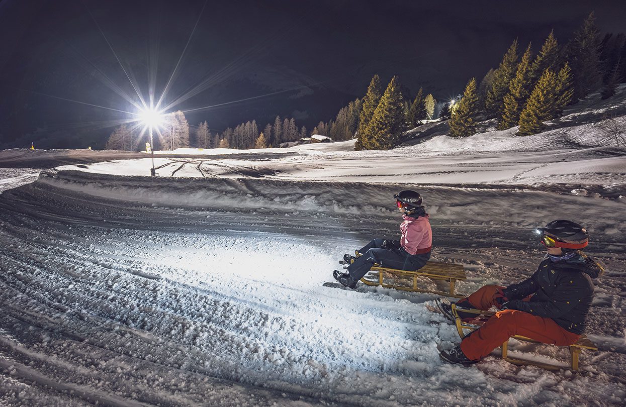 Sledging after sunset at Rinerhorn, image by Jo Werner, Switzerland Tourism